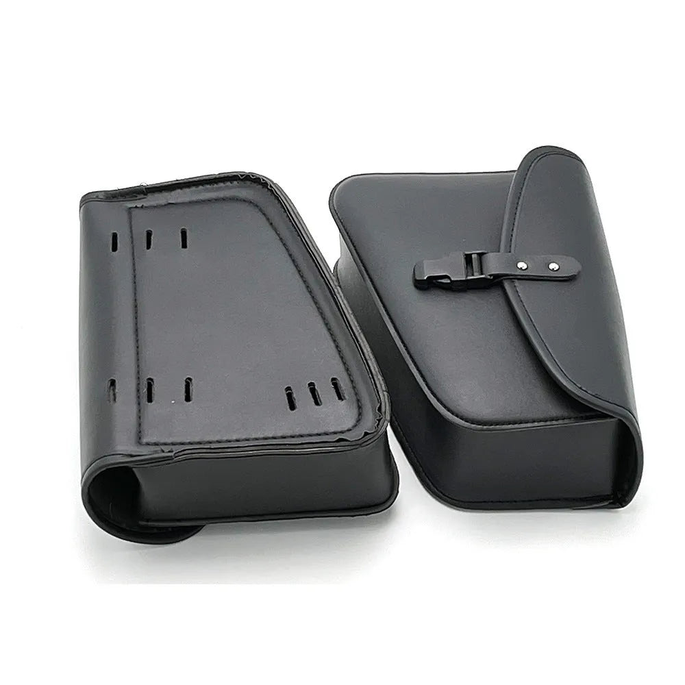Black PU leather motorcycle swingarm saddlebag mounted on a Harley Sportster side.