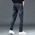 Men's slim straight casual trousers in polyester fabric with micro elasticity and zipper fly