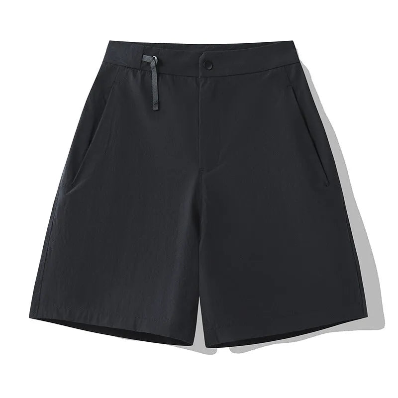 Men's khaki quick-drying sports shorts with elastic waist and 3D cut design for running and outdoor activities.