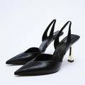 Women's pointed patent leather high heels in nude apricot colour with a shallow mouth design.