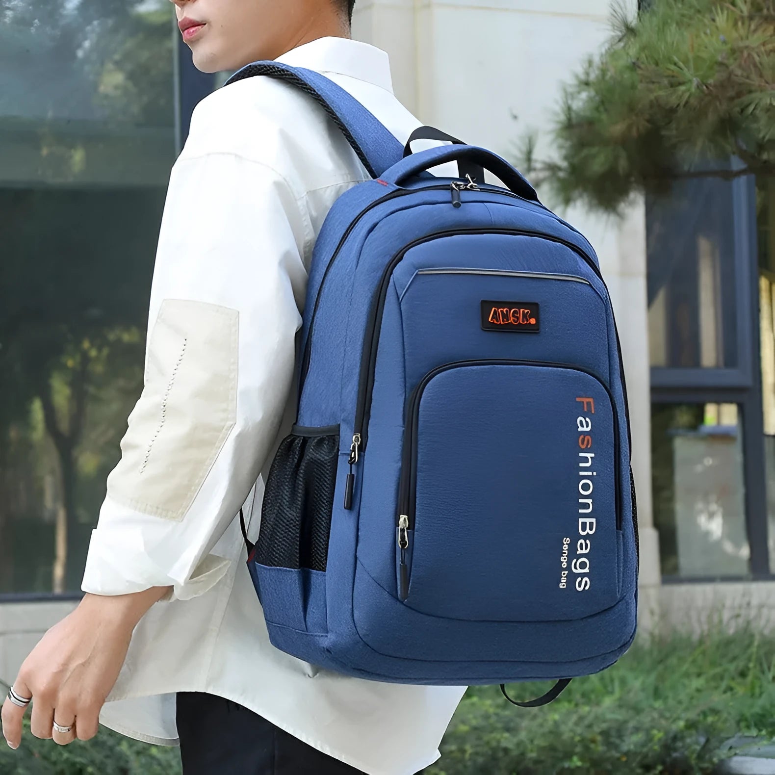 Large black nylon fashion backpack with multiple internal compartments and double shoulder straps.