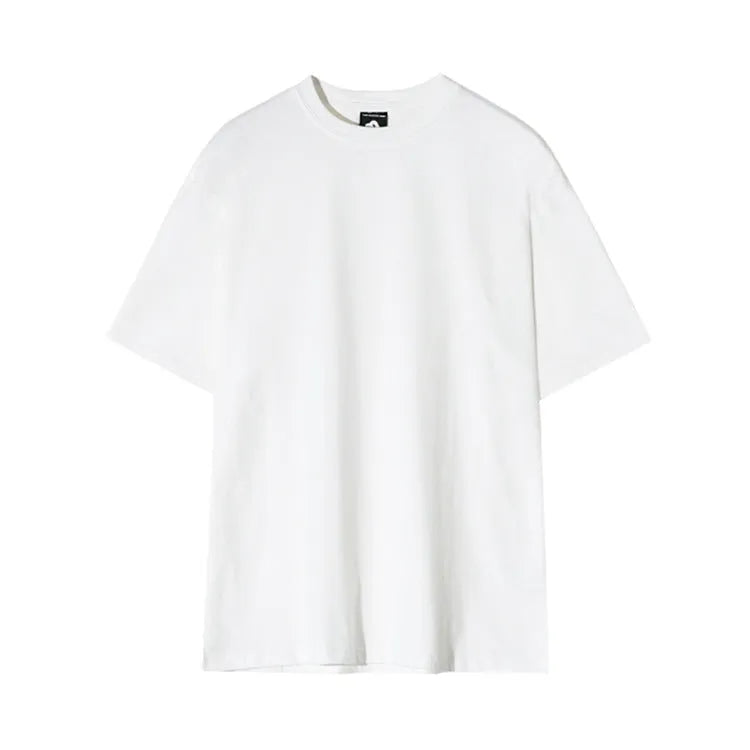 Men's slim fit cotton t-shirt in black, showing round neck and half-sleeve design.