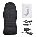 Black electric cervical vertebra massager with wireless remote control on a table.