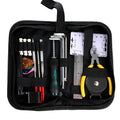 Black plastic and metal guitar repair tool kit for guitar, bass, mandolin, banjo maintenance.