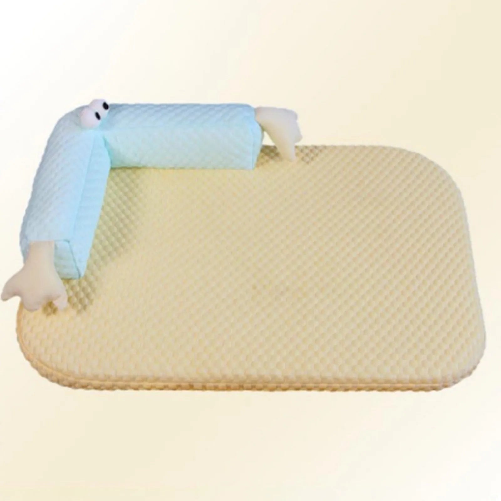 Blue and yellow big-eyed monster design pet bed cushion for dogs and cats on a wooden floor.