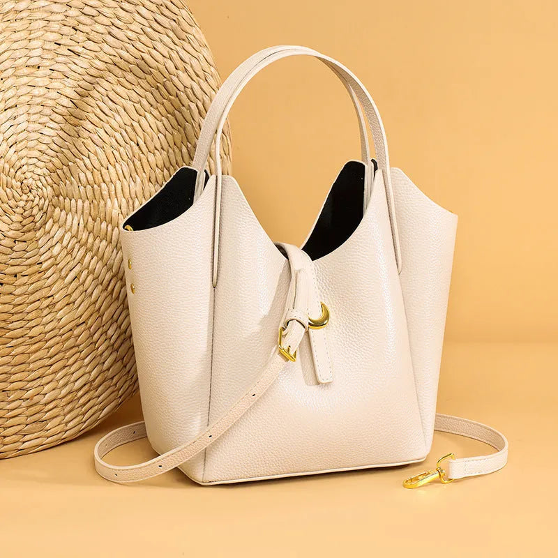 Genuine leather women's large capacity bucket handbag in retro style with internal file organisation
