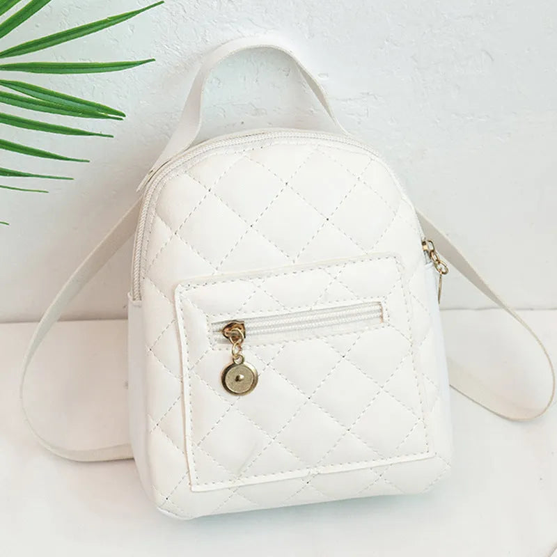 Girls' hard case square backpack with embroidery in white, black, or pink colours, showing soft handle and dimensions.