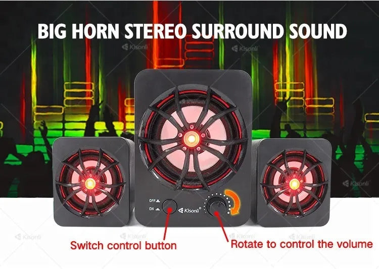 Green U-2600 2.1 USB computer speaker with colourful LED lights on a desktop.