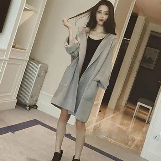 Plus size women's thin long sleeve coat in loose fit with lace detailing.