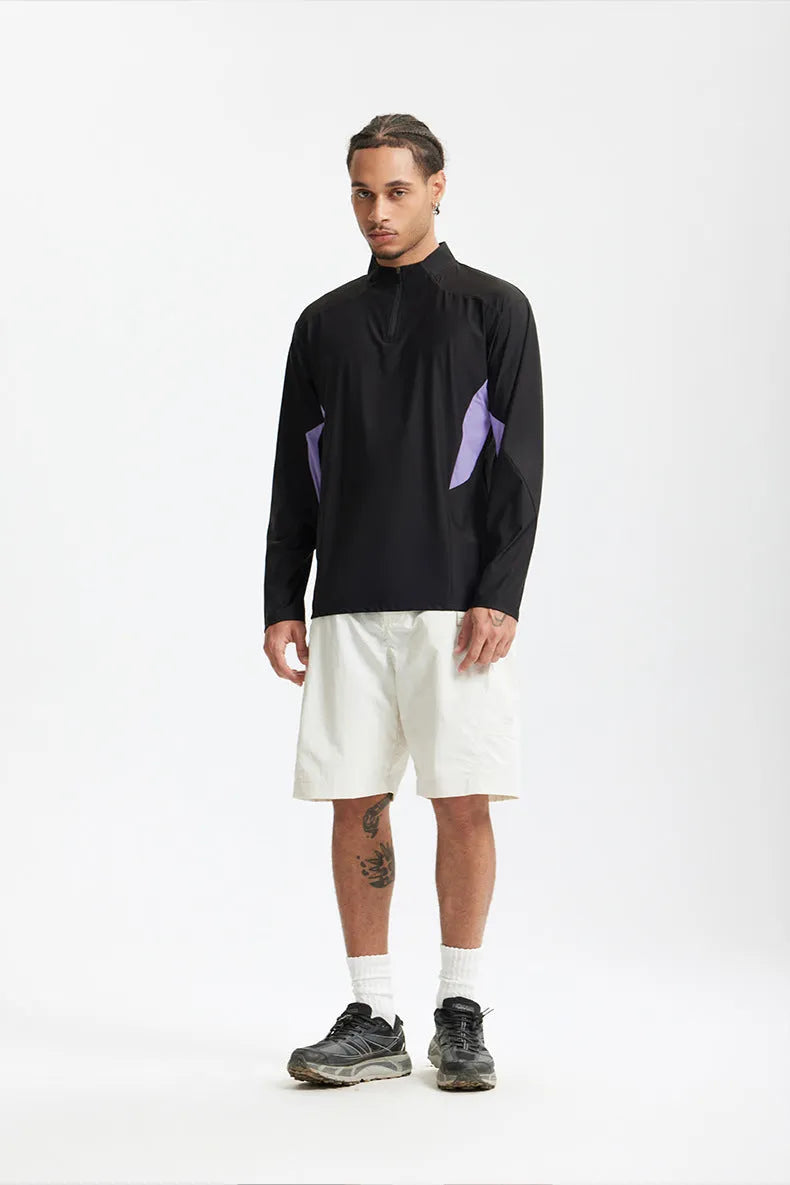 Men's lightweight solid-colour polyester top in black, available in long sleeve and short sleeve styles.
