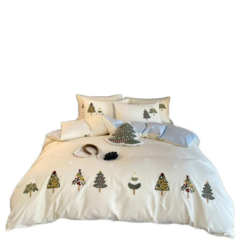 Cream blue cotton duvet cover with embroidered Christmas tree and floral pattern, part of a four-piece bedding set.