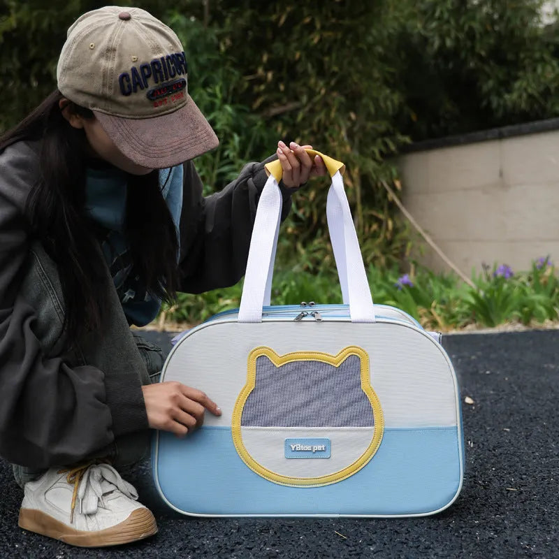 Blue foldable Oxford cloth cat backpack for outdoor use with mesh ventilation panels.