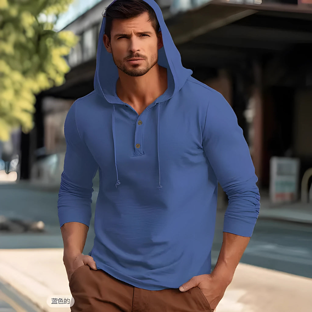 Men's dark blue cotton pullover hoodie with long sleeves on a hanger