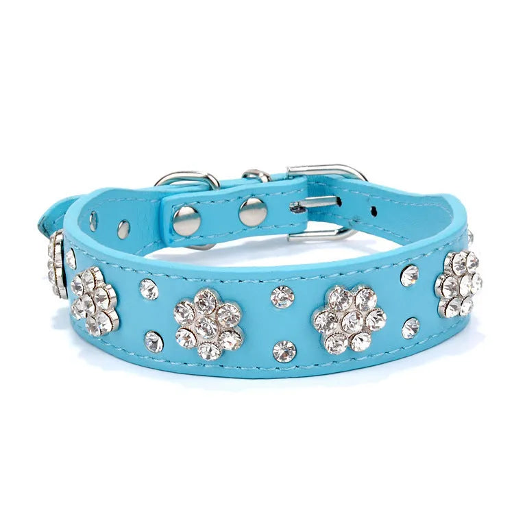 Soft black PU leather dog collar with a sparkling rhinestone flower pattern and metal adjustment buckle.
