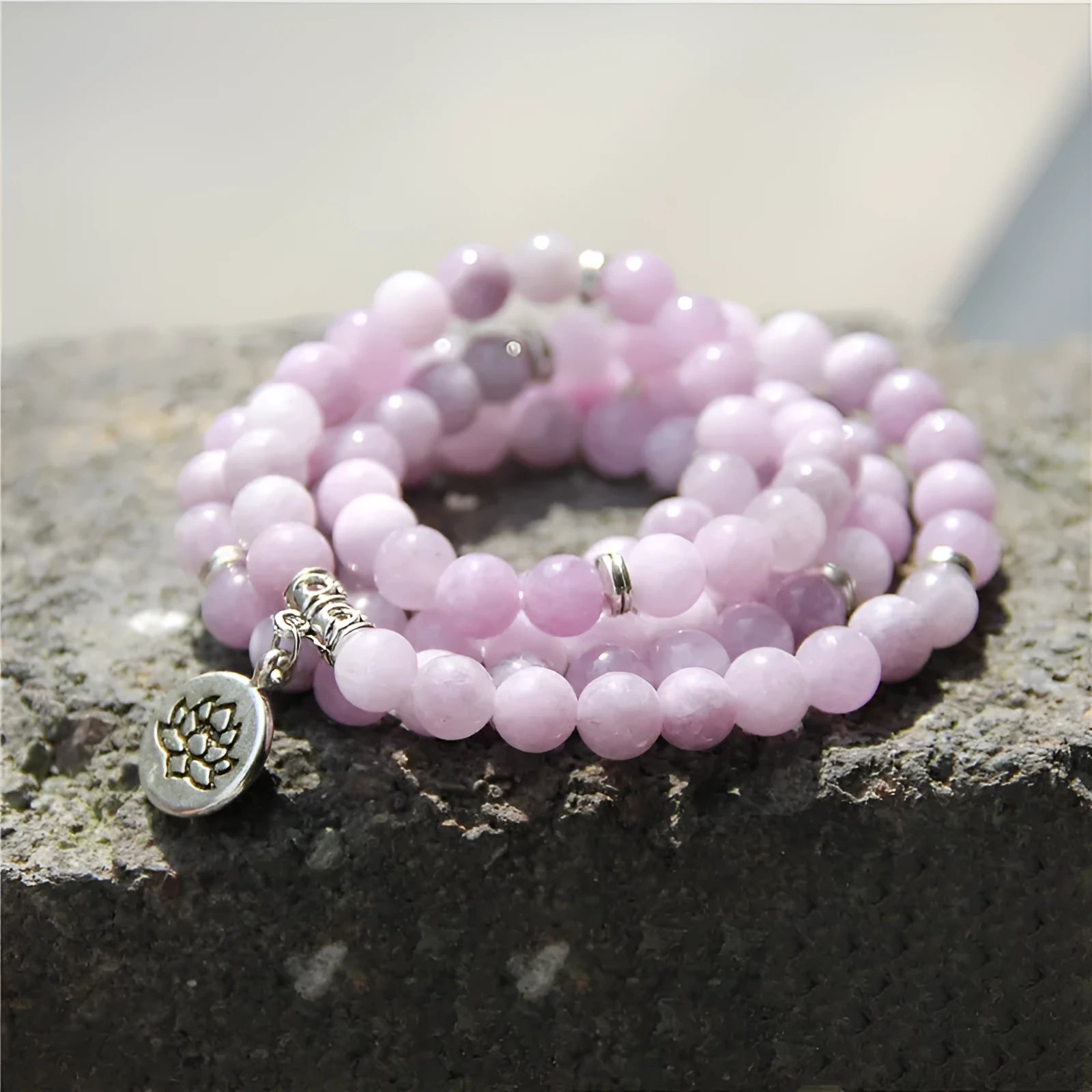 Women's natural stone bracelet with lotus elements and geometric design
