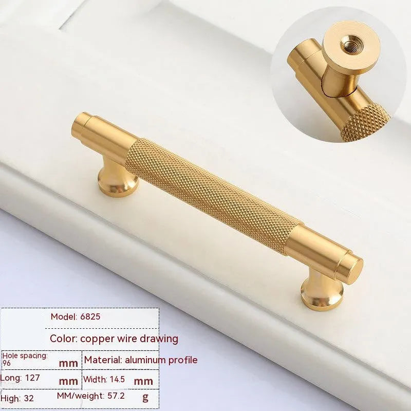 Brushed brass aluminium alloy furniture handle on a white background, showing hole spacing options.