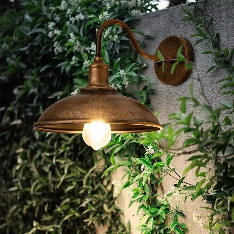 Retro style exterior wall lamp for villa courtyards in copper or silver finish with right angle or bevel mount options.