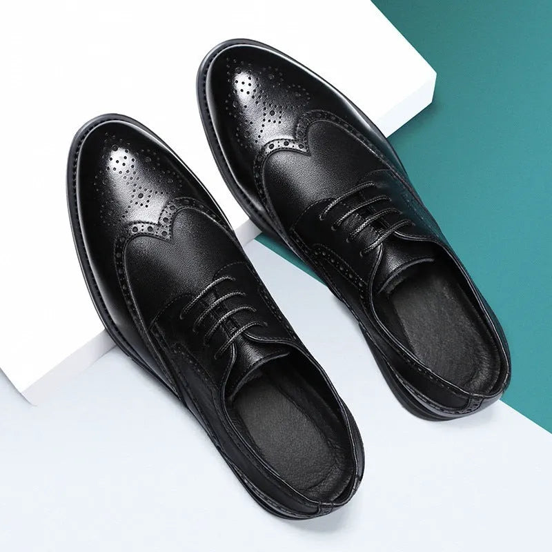 Men's black and brown brogue business shoes with classic detailing, shown from the side.