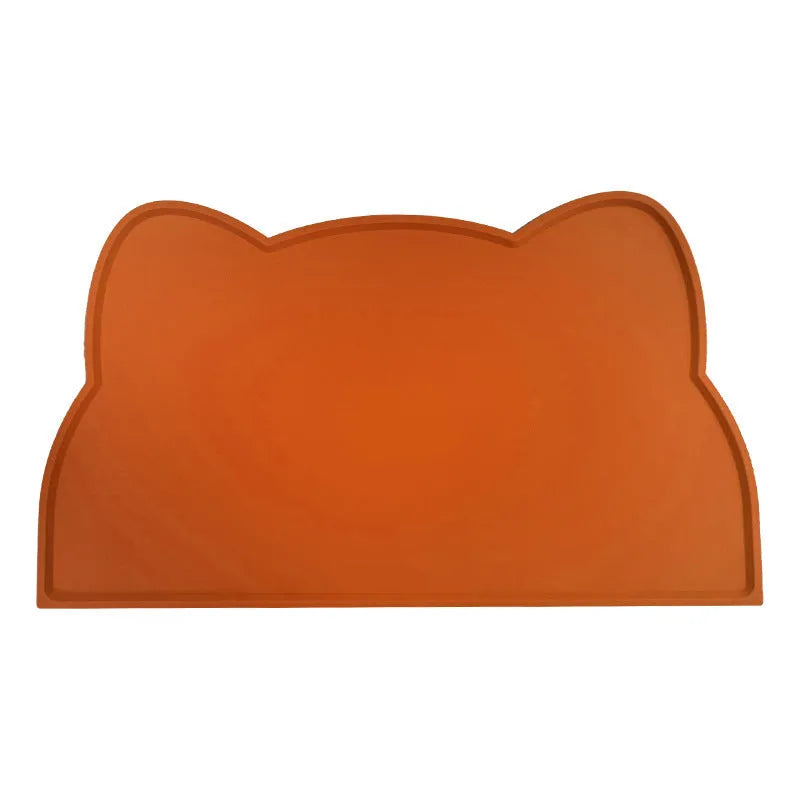 Blue silicone pet feeding mat with raised border for dog and cat food bowls