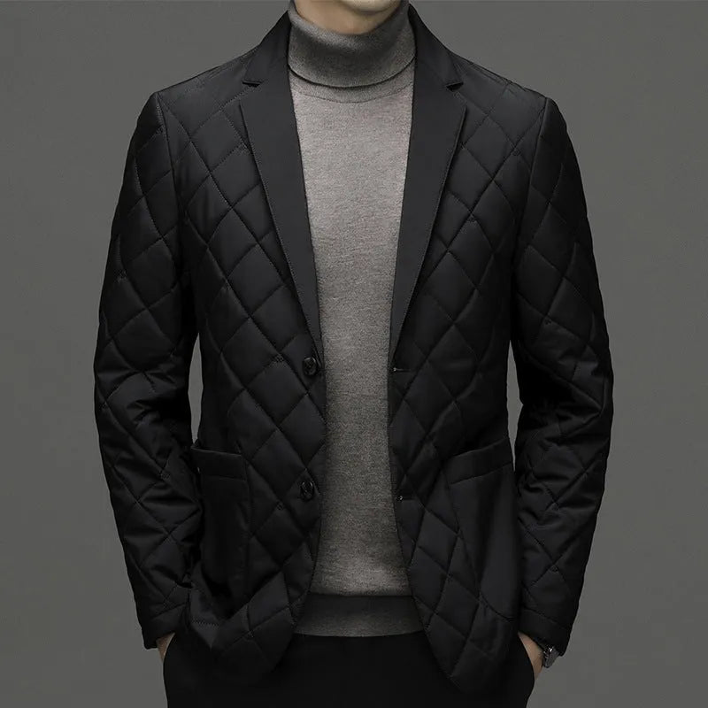A man wearing a solid-colour thick down jacket with a lapel and side seam pockets.