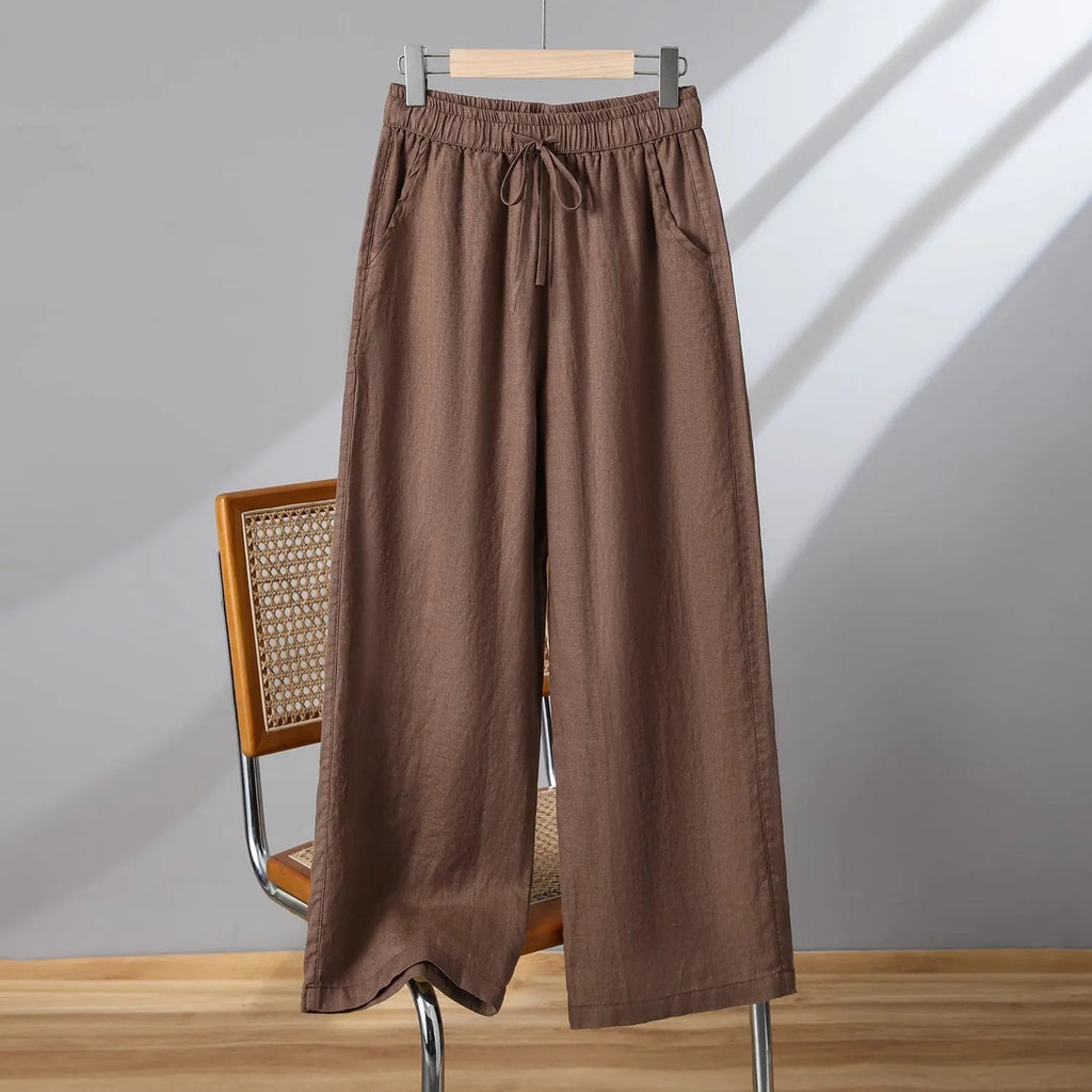 Women's straight-leg casual trousers in apricot colour with elastic drawstring waist