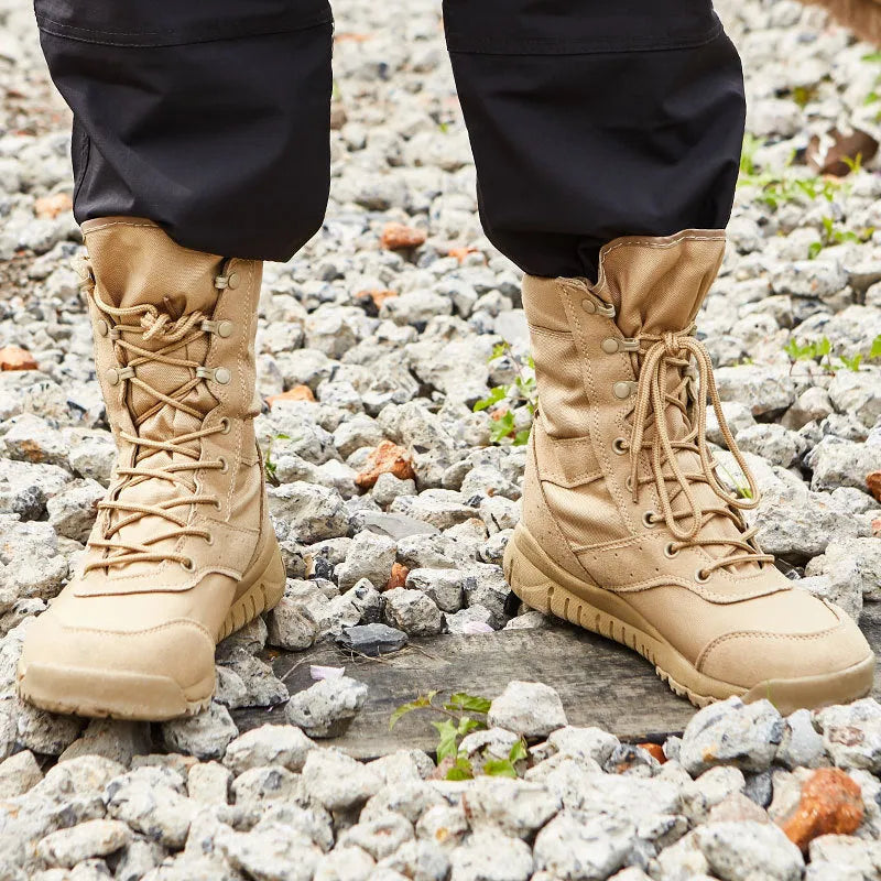 Black and sand coloured Yulong tactical combat boots for outdoor hiking and sports.