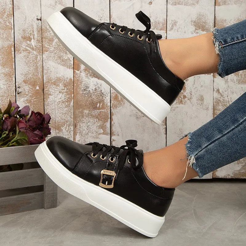Lace-up flats with metal buckle design, round toe, artificial PU upper, rubber sole, front tie, available in black