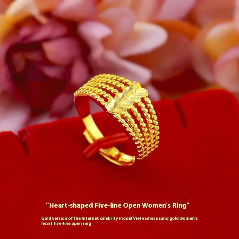 Metal ring with open mouth design and Fu character heart motif in Five Line Love colour