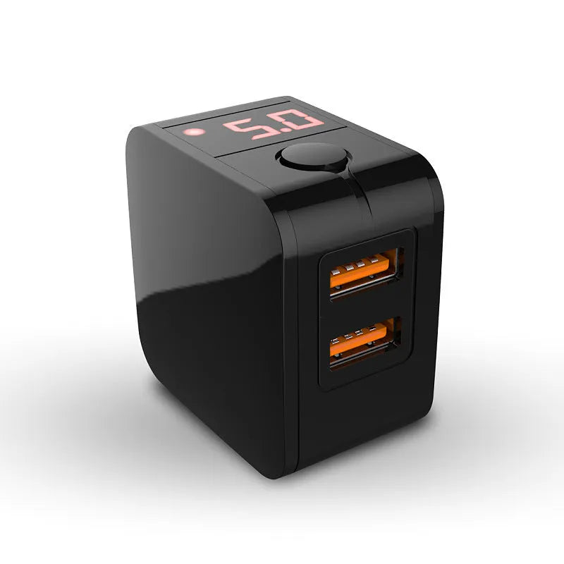 Black dual USB fast charger with digital display showing 5V output and UK plug