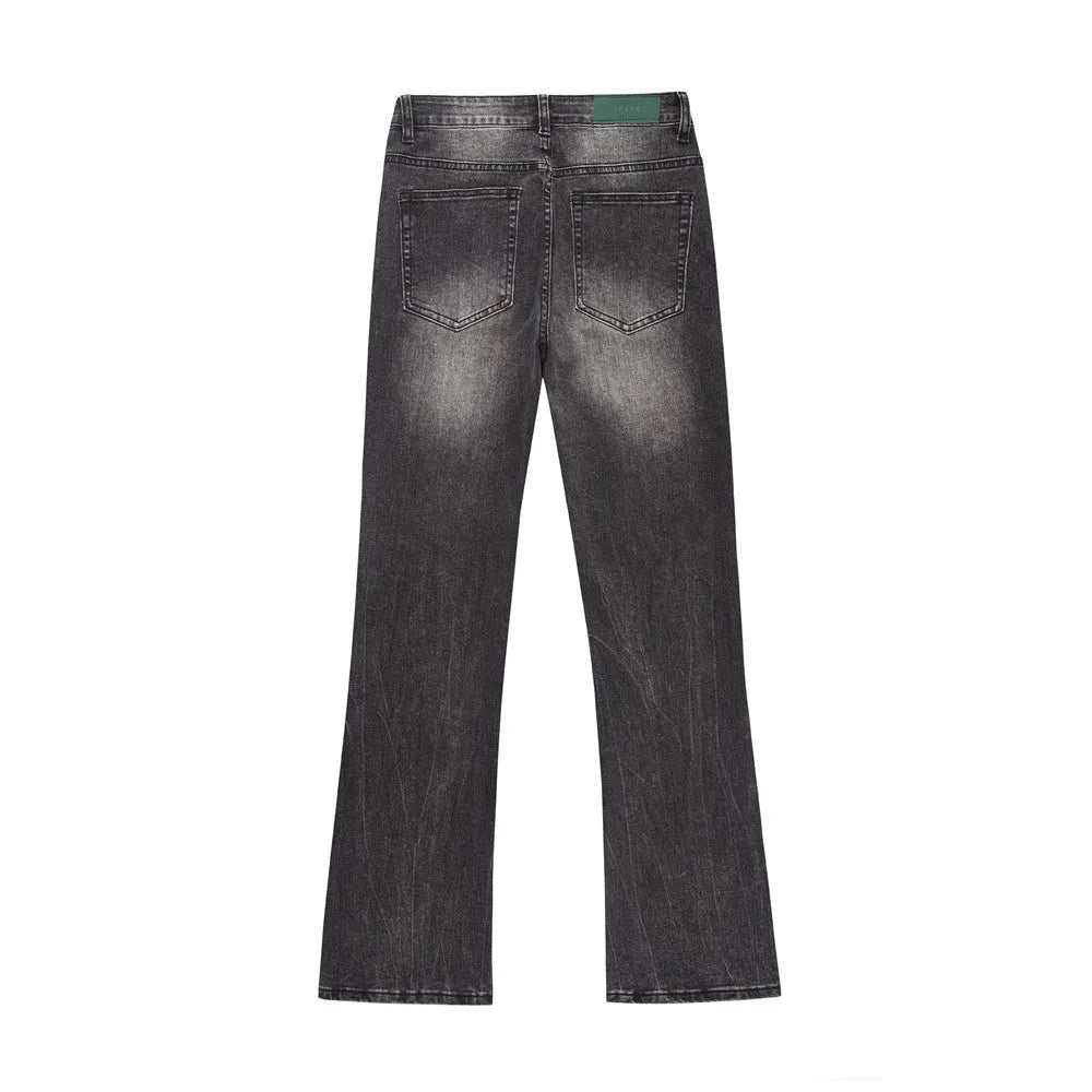 Men's black washed wear-white denim jeans on a plain background showing front view