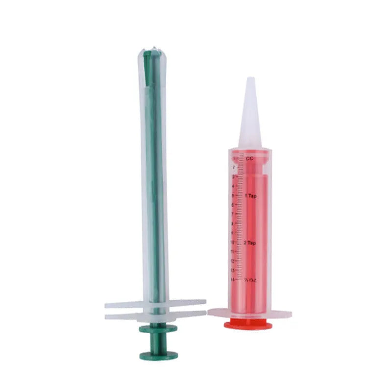 Two pet pill shooter guns with soft silicone tips for administering tablets to cats and dogs