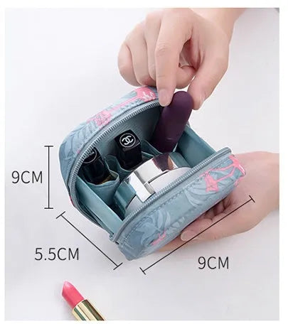 Cloth cube-shaped makeup storage bag in plain pattern available in blue, pink, white, and white pink colours