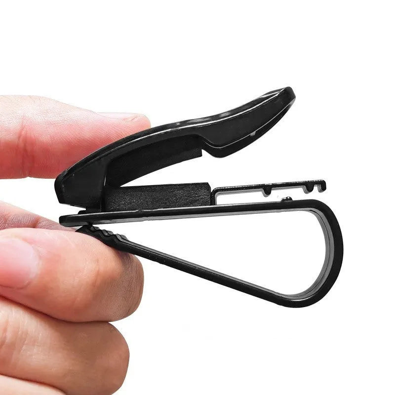Black plastic car sunshade clip for organising glasses, tickets and identification cards
