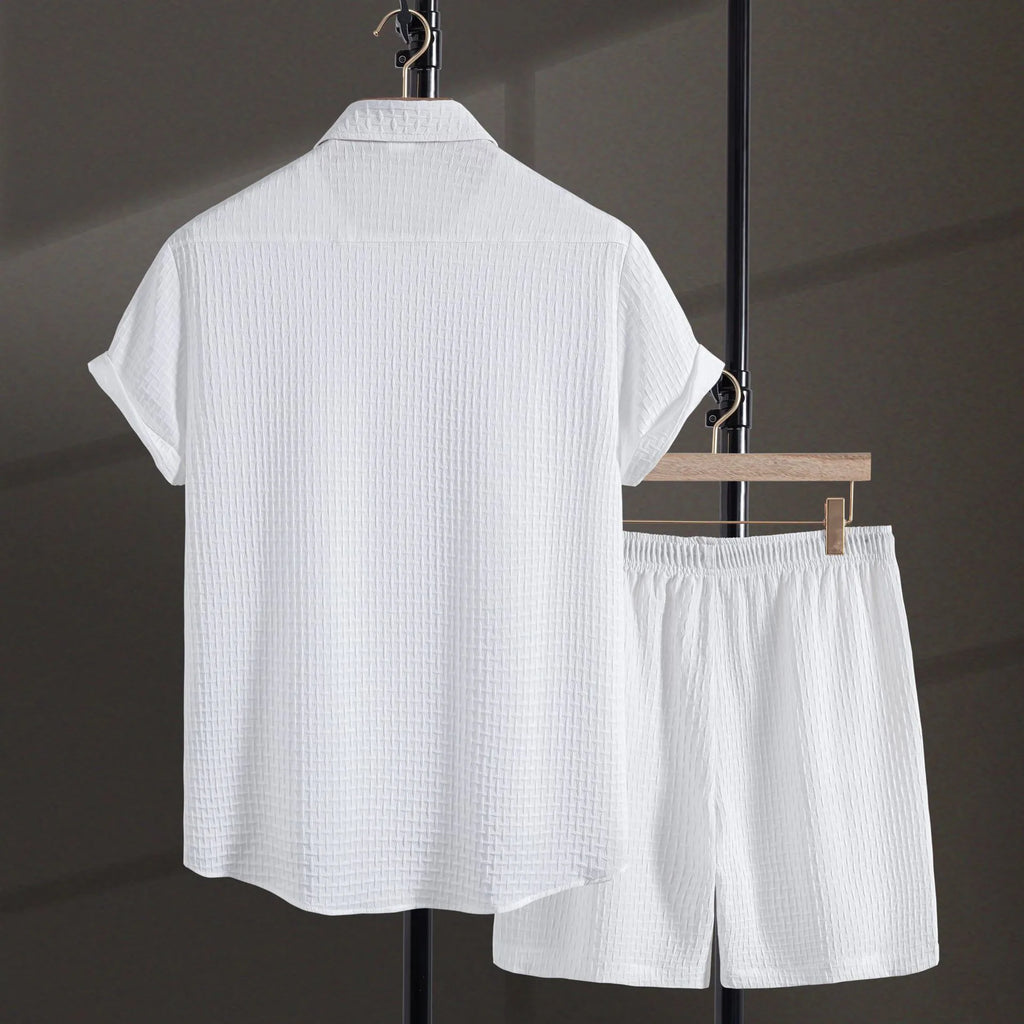 Men's loose-fit cotton blend shirt and shorts co-ord set in solid black colour.