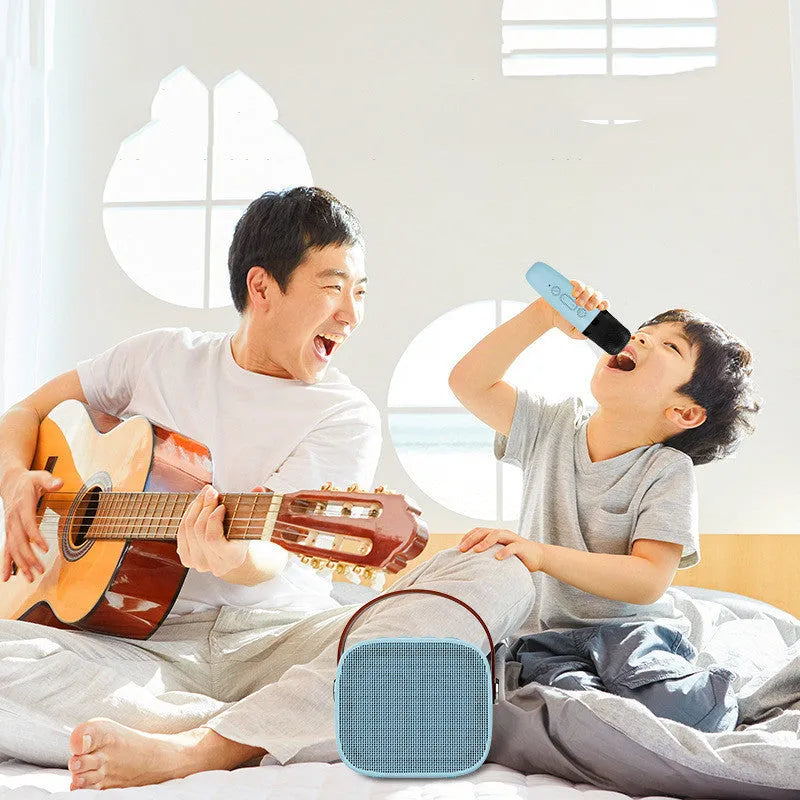 Compact portable Bluetooth speaker with microphone in white pink or blue plastic shell