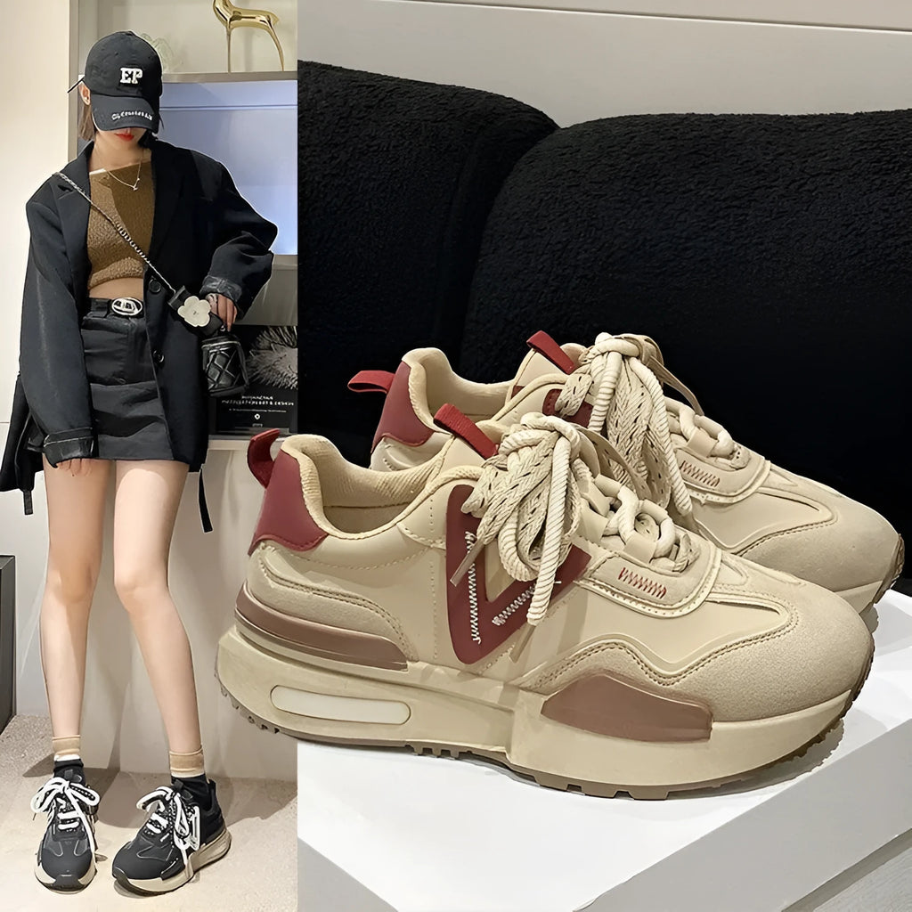 Retro platform sports shoes in black with round toe and front lace-up design