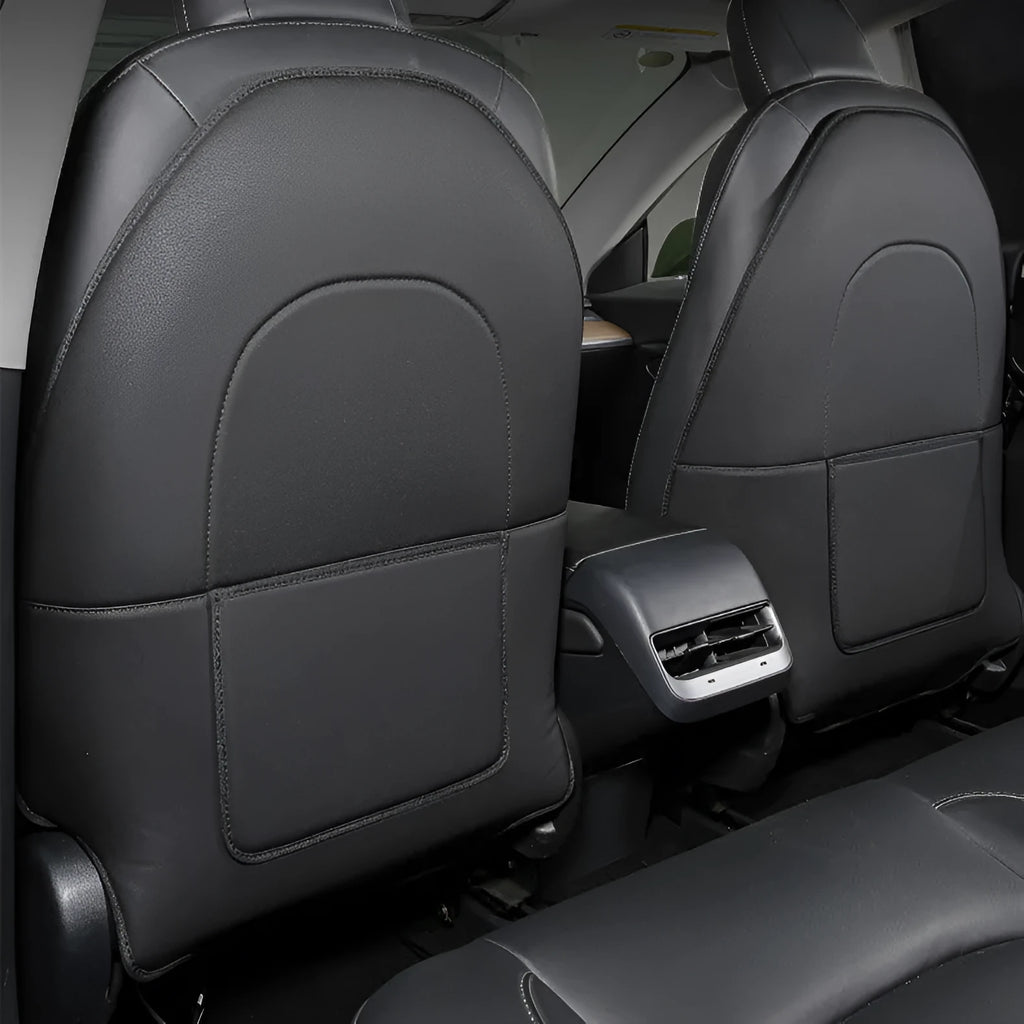 Pair of black leather car seat kick pads showing single pocket and full 68cm by 42cm coverage