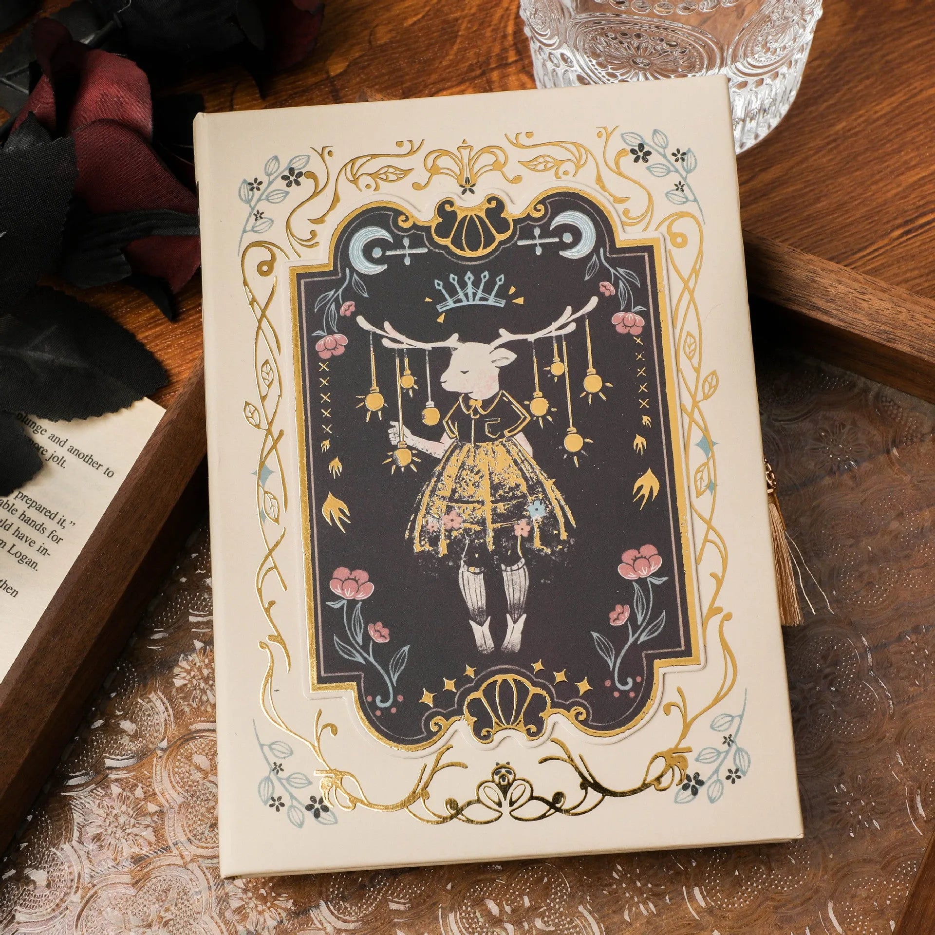 A5 retro Gothic art notebook with thematic cover, shown next to pen for scale