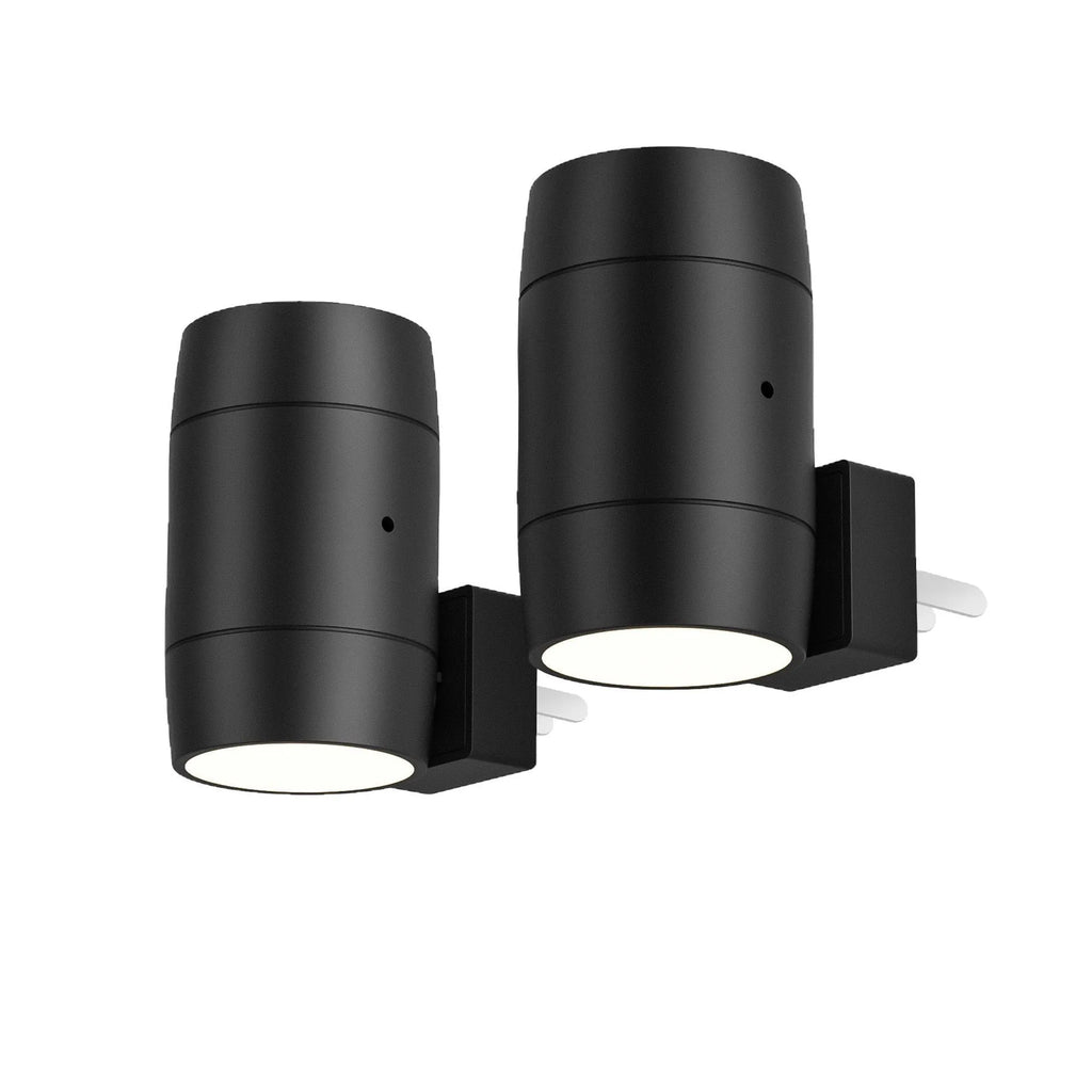 Small white induction night lamp plugged into wall socket with adjustable brightness and rotatable warm light