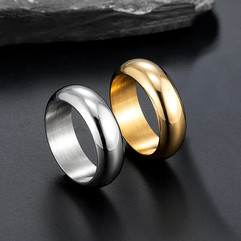 Glossy electroplated titanium steel ring in gold, black, and steel colour options showing polished finish