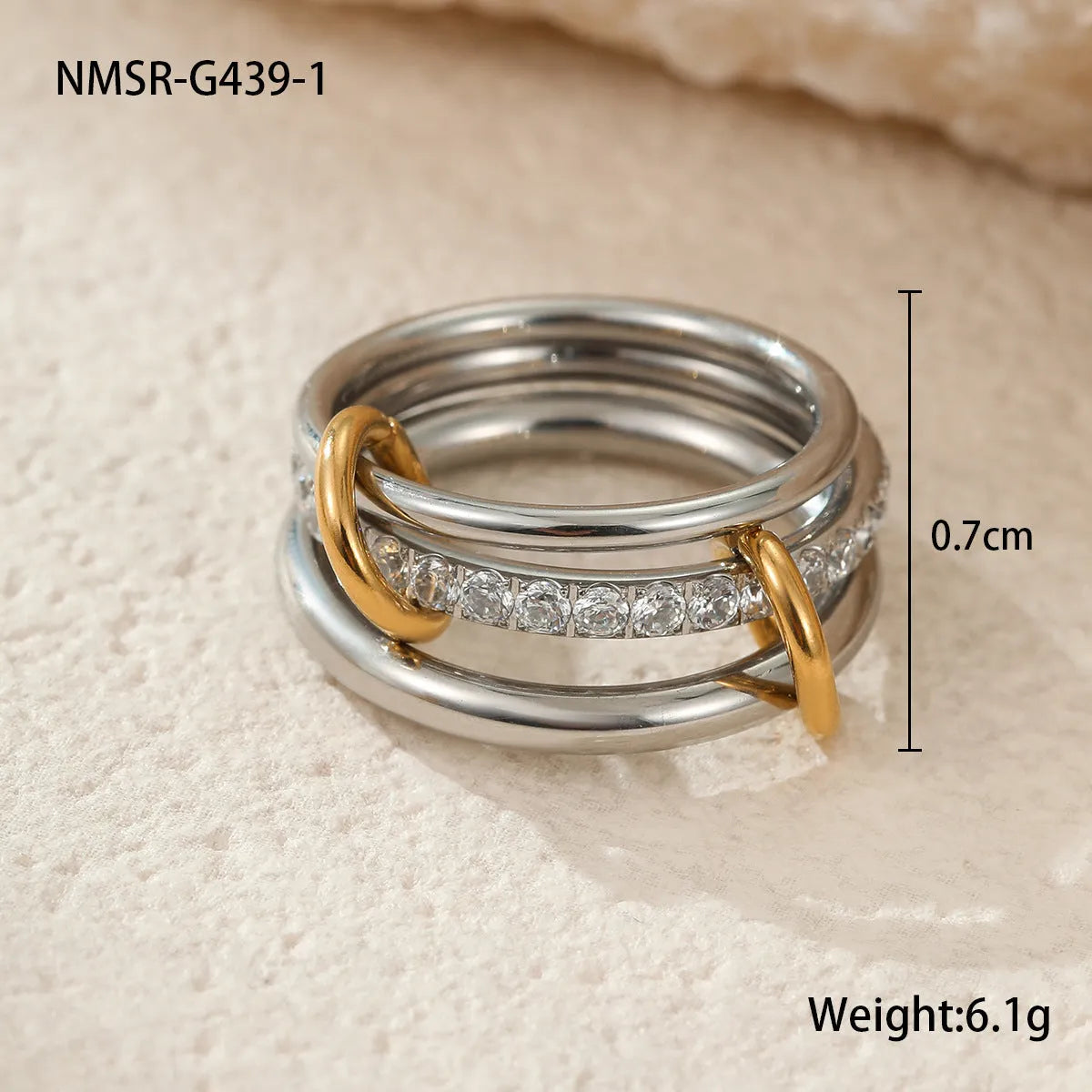 Gold plated stainless steel stacked ring set for women in an exaggerated design.