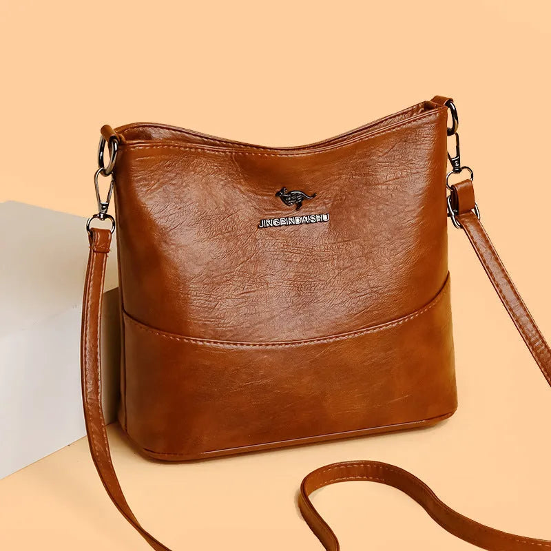 Women's soft leather shoulder bag in bucket style with large capacity and minimalist design