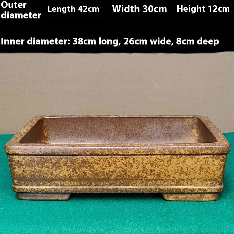 Straight shallow rectangular Yixing Zisha flowerpot made of purple sand clay.