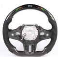 Black carbon fibre BMW steering wheel with LED elements and paddle shifters