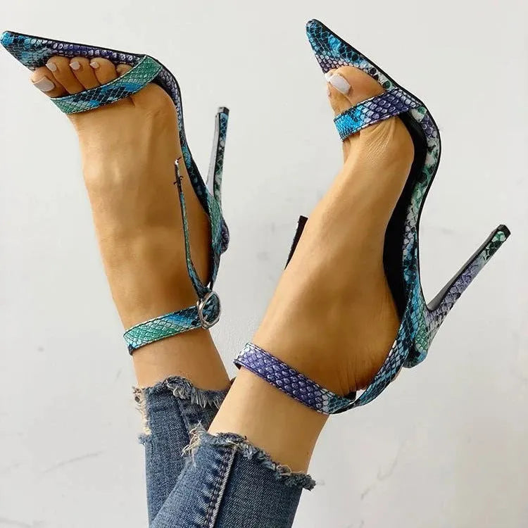 Blue women's high heels with snake print, buckle fastening, and pointed toe.