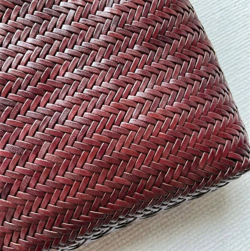 Brown woven leather tote bag with three-dimensional pockets measuring 27x30x6cm