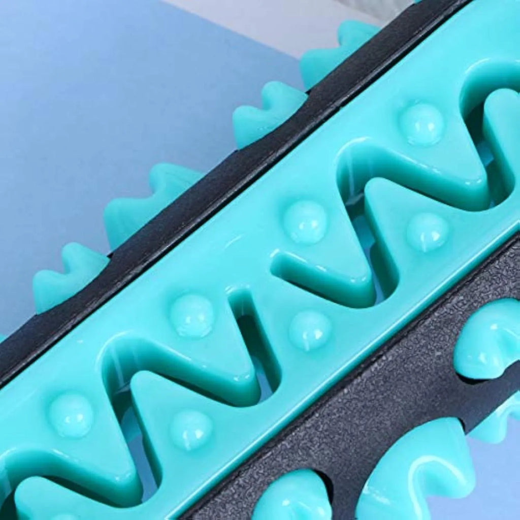 Natural rubber dog toothbrush chew toy in blue, showing textured surfaces and measuring 15 cm long.