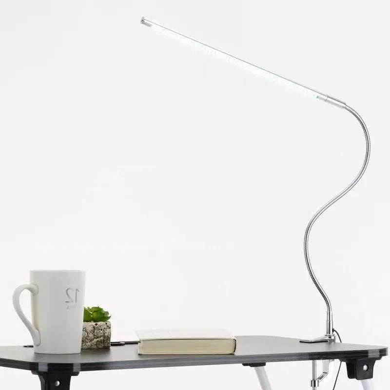 Silver aluminium alloy USB LED table lamp with a long arm and clip, showing 48 SMD beads for nail lighting.