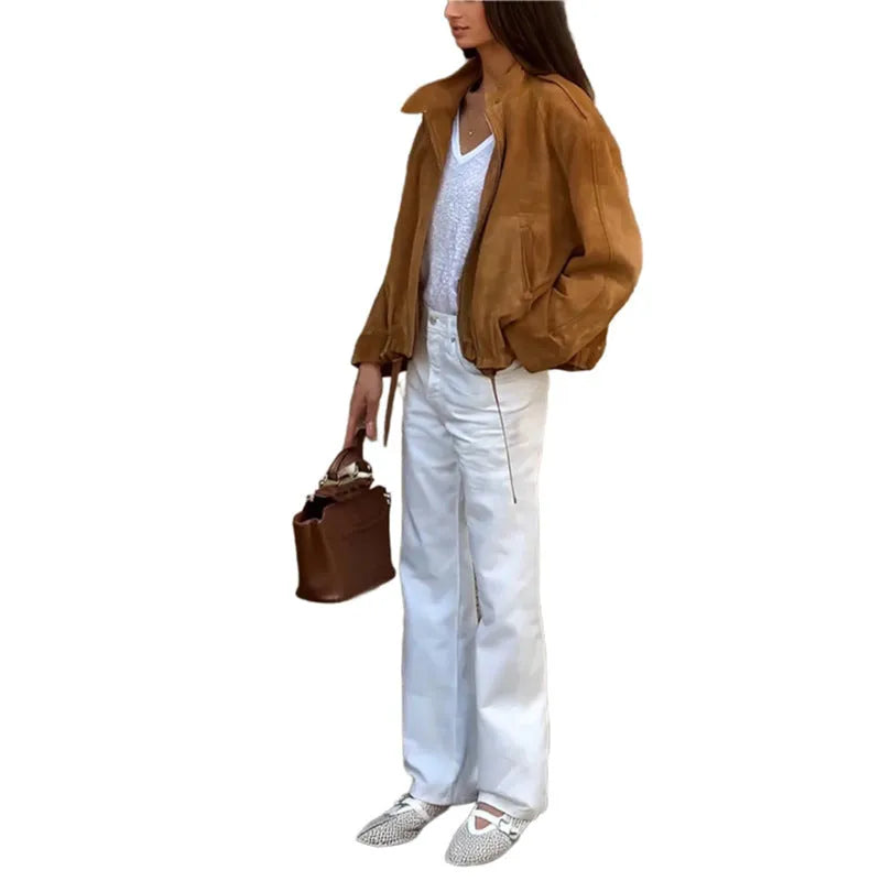 Man wearing a solid colour loose-fit retro polyester jacket