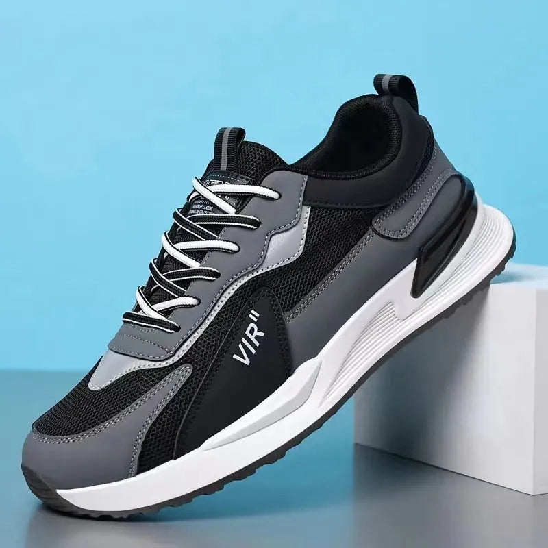 Men's colour block mesh casual running shoes in black, flat heel and round toe design.